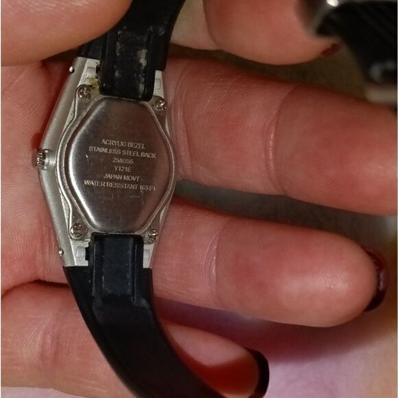 Ladies Armitron with a black rubber band and round silver face - Picture 8 of 9